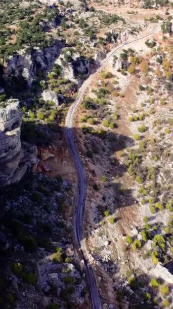 Drone Hovers Mountain Valley Revealing Winding Dirt Road Stunning Aerial — Stock Video