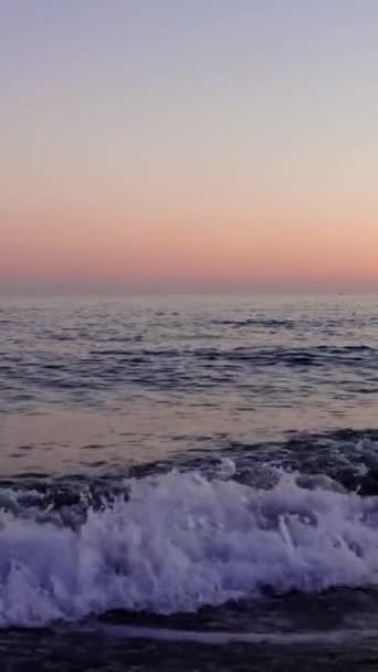 Sunset Illuminates Sea Surf Waves Gently Reaching Sandy Beach Waves — Stock Video