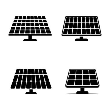 Temiz, yenilenebilir enerji kaynakları ve çevre dostu teknolojik gelişmeleri tasvir eden siyah bir arka planda dört güneş paneli simgesi gösterilir..