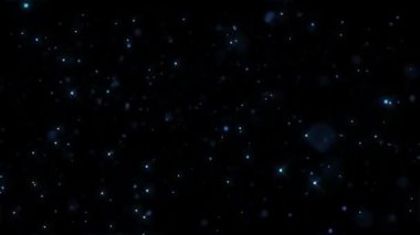 Siyah bir arkaplanda hareket eden soyut titreşen parçacıkların animasyonu. Mavi parlak partiküller odaklanıyor