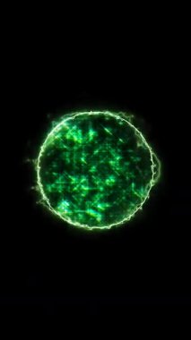 Karmaşık bir yeşil enerji küresi ışık ve desenlerle titreşir. Derin, siyah bir arkaplan karşısında canlı görsel efektler sergiler..