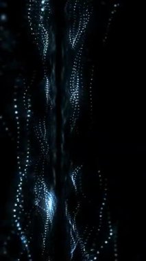 Aydınlatılmış parçacıkların soyut görsel deneyim için karanlık bir ortamda akıcı bir şekilde akışını izle.