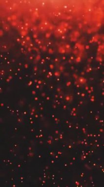 Bu görsel, karanlık bir arkaplan üzerinde parlayan parçacıkları soyut bir hareket efekti oluşturarak gösterir.