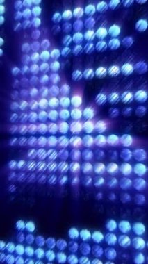 Parlak mavi ışıklar bir konserde bir model oluşturur. Aydınlanma dinamik ve soyut bir etki yaratır. Telefonlar için dikey duvar kağıtları.