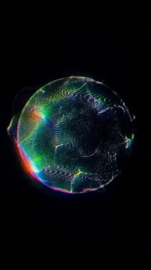 Küre, renkleri yansıtan parçacıklar ile yavaşça döner. Sanatsal bir temsil. Telefonlar için dikey duvar kağıtları.