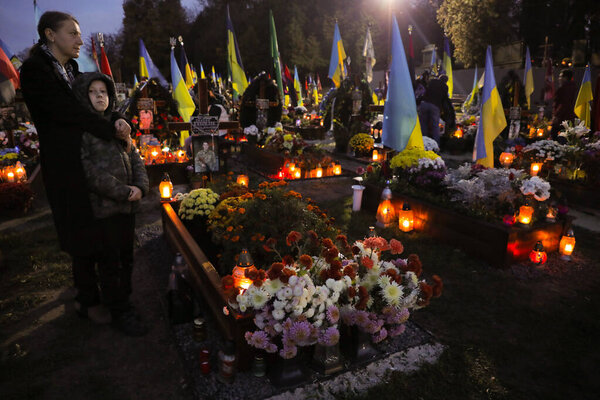 Lviv, Ukraine, 1 November 2022. Ukrainians light candles while visiting the graves of Ukrainian soldiers who died in the war with Russia marking All Saints' Day and All Souls' Day at the Lychakiv Cemetery in Lviv,. Russia invaded Ukraine on 24 Februa