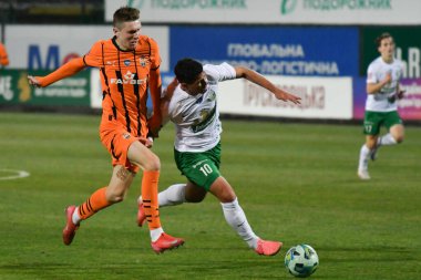 Lviv, UKRAINE - 11 Mart 2025. Ukrayna Premier Ligi 'nde FC Karpaty Lviv ile FC Shakhtar Donetsk arasında oynanan maçta Ukrayna' nın başkenti Lviv 'deki Ukrayna Stadyumu' nda oynanan karşılaşmada Karpaty 'den Igor Neves, Shakhtar' a karşı.. 