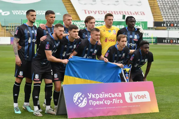 Lviv, UKRAINE - 30 Mart 2025. Ukrayna Premier Ligi FC Karpaty Lviv ve FC Chornomorets arasında 30 Mart 2025 tarihinde Ukrayna 'nın başkenti Lviv' de oynanan Ukrayna Premier Ligi karşılaşmasında Chornomorets oyuncuları görüldü.. 
