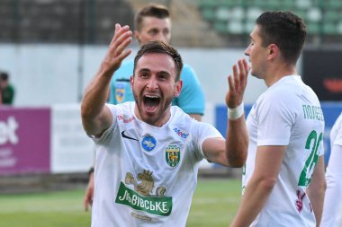 Lviv, UKRAINE - 11 Mayıs 2025. Ukrayna Premier Ligi 'nde Ukrayna Stadyumu' nda FC Karpaty Lviv ile FC Oleksandriya arasında oynanan maçta gol attıktan sonra Karpaty 'li Ambrosiy Chachua tepki gösterdi..