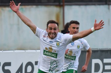 Lviv, UKRAINE - 11 Mayıs 2025. Ukrayna Premier Ligi 'nde Ukrayna Stadyumu' nda FC Karpaty Lviv ile FC Oleksandriya arasında oynanan maçta gol attıktan sonra Karpaty 'li Ambrosiy Chachua tepki gösterdi..