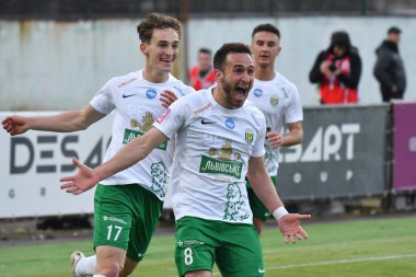 Lviv, UKRAINE - 11 Mayıs 2025. Ukrayna Premier Ligi 'nde Ukrayna Stadyumu' nda FC Karpaty Lviv ile FC Oleksandriya arasında oynanan maçta gol attıktan sonra Karpaty 'li Ambrosiy Chachua tepki gösterdi..
