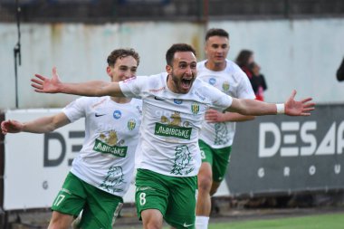 Lviv, UKRAINE - 11 Mayıs 2025. Ukrayna Premier Ligi 'nde Ukrayna Stadyumu' nda FC Karpaty Lviv ile FC Oleksandriya arasında oynanan maçta gol attıktan sonra Karpaty 'li Ambrosiy Chachua tepki gösterdi..