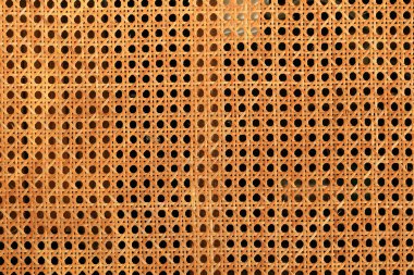 Arka plan olarak turuncu fare ağı. Delikli fare ağlarının dokusu