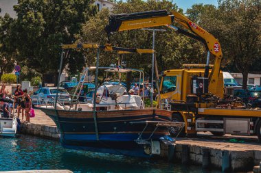 Krk Yat Kaliteli fotoğrafı başlatmak için manipülatörün İşlemi