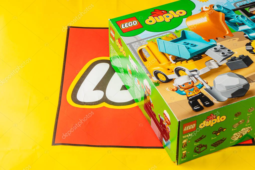 24.03.25 Lviv Ukraine A vibrant construction playset with various vehicles and building elements is showcased against a bright yellow background featuring a bold logo.