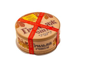 03.24.25 Lviv Ukrayna Yuvarlak teneke kutu, sonbahar temalı tasarımlarla güzelce paketlenmiş çeşitli kekleri gösteriyor. Toplantılar sırasında ya da herhangi bir durum için hediye olarak paylaşmak için mükemmel..