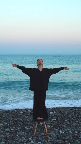 Girl Linen Suit Stands Swings Chair Seashore Dawn — Stock Video