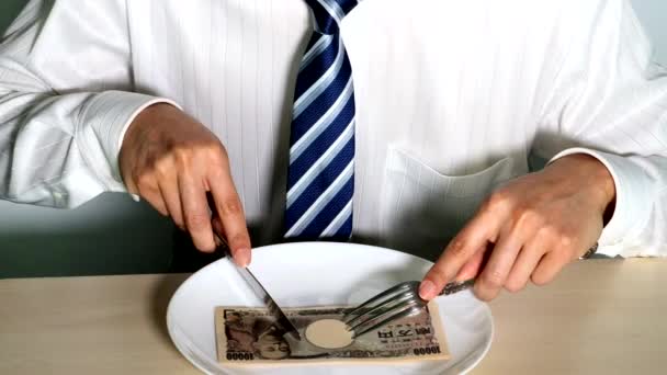 Bild Eines Geschäftsmannes Der Geld Isst — Stockvideo