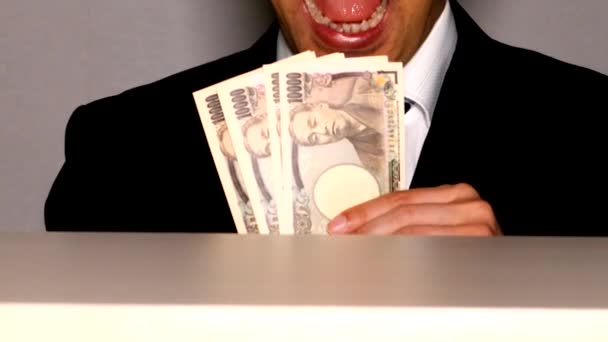 Ein Geschäftsmann Der Eine Geste Macht Geldscheine Essen — Stockvideo