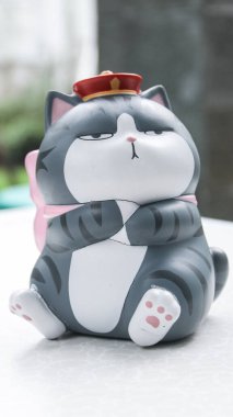 Wu Huang kedi oyuncağı. Bir Çin kedisi, iyi şans sembolü.