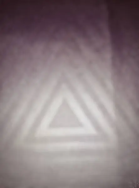 stock image Blurred, the motif or triangular symbol of the design of a koko shirt, texture. Textured triangle.