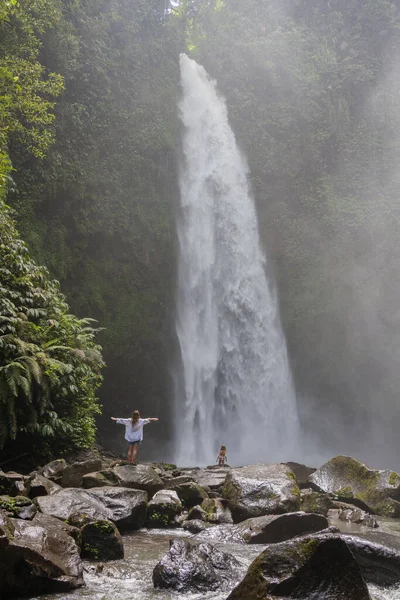 Young Family Mother Daughter Travellers Explore Waterfall Bali Jungle Travel — Stock Photo, Image