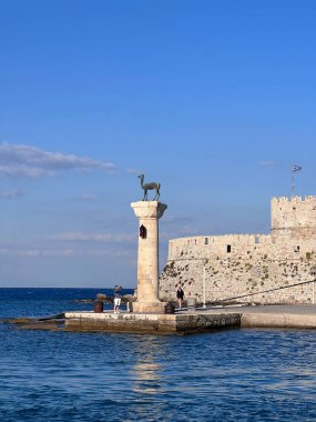 Colossus of Rhodes sunny day blue sky. High quality photo