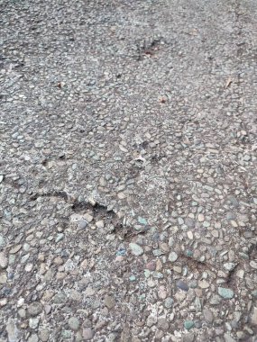 the texture and pattern of gravel or small cobblestone roads clipart