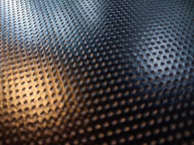 Arkaplan için siyah delikli poliüretan PU malzeme dokusu