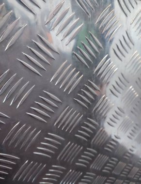 Gümüş desenli ve arka planlı metal yüzey