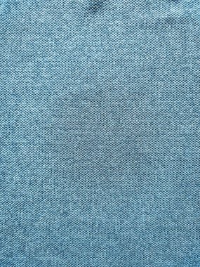 Mavi spor giyim kumaş futbol tişörtünün dokusu ve arka planı