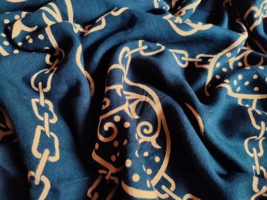 Zincir desenli mavi kumaşın dokusu ve arkaplanı