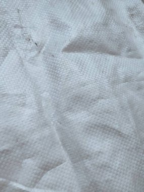 Beyaz çuval dokusu ve deseni. Basit beyaz bir arkaplan üzerine kurulmuş. Sancaklar için, web sitesi kapakları