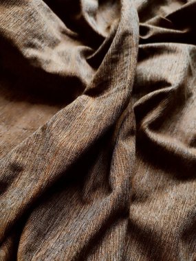 Texture and background of natural wood grain lines on a fabric clipart