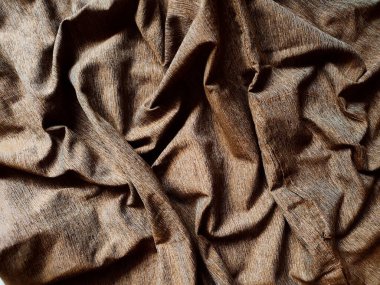 Texture and background of natural wood grain lines on a fabric clipart