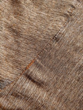 Texture and background of natural wood grain lines on a fabric clipart