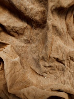 the texture and background of the brown cloth is damaged and dirty clipart