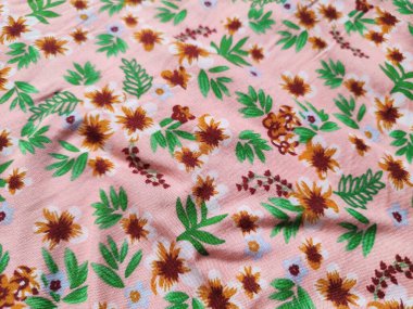 fabric patterns and backgrounds with leaf and flower motifs clipart