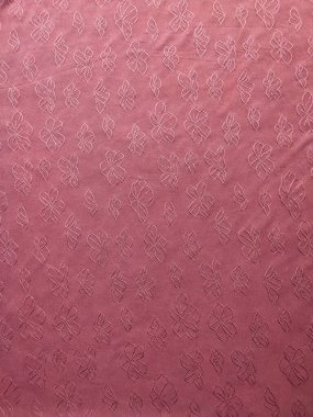 Çiçek motifli pembe kumaşın dokusu ve arka planı