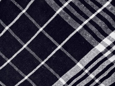 Siyah kumaş arkaplan ve beyaz çizgili desen