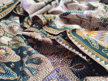 Tekstil, kaplama, ambalaj kağıdı ve ağ için renkli bitki ve çiçek desenleri. Dekoratif unsurları olan etnik vektör duvar kağıdı. Endonezya Batik desenleri ve geçmişi