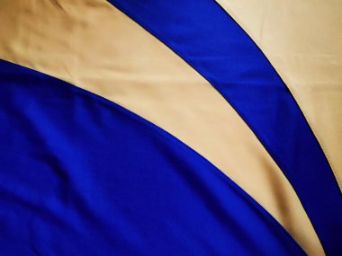 Sarı ve mavi kumaşın deseni ve arkaplanı