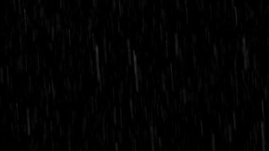 Siyah arkaplana yağan yağmur.