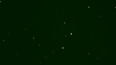 Toz, daireler, bokeh etkisi yeşil arka planda rastgele farklı yönlere hareket ediyor, soyutlama.