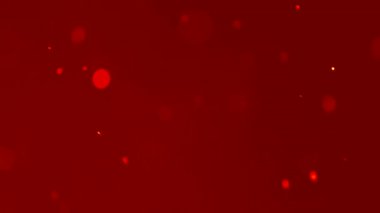 Toz, daireler, bokeh etkisi kırmızı arka planda rastgele farklı yönlere hareket ediyor, soyutlama.