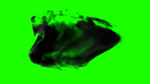 Une énorme explosion de feu et des nuages sombres de fumée sur fond vert. L'abstraction.