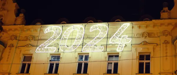 2024 neon sign on the facade of a building in Zagreb, Croatia.