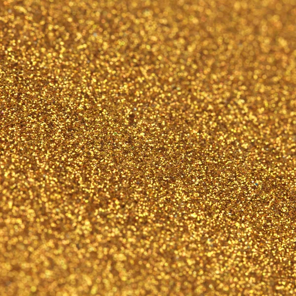 輝く輝く明るい輝く抽象的な背景は光沢のある水晶色の配列から 輝く黄金の背景として完璧です — ストック写真
