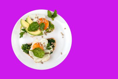 Top view healthy avocado toasts breakfast lunch fried eggs on isolated background.