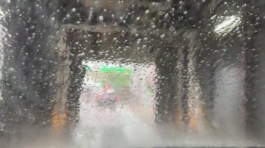 Automatic car wash machine view from inside the car.